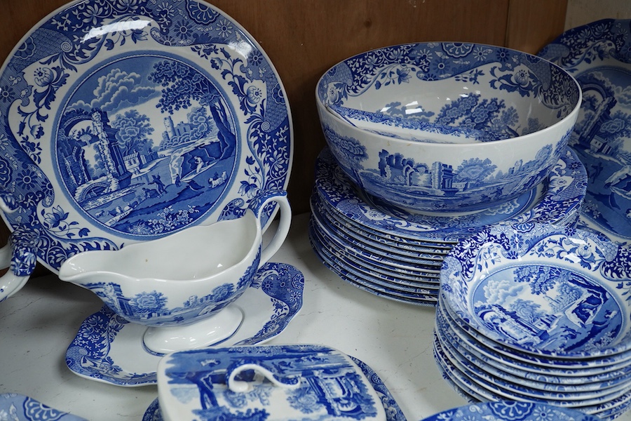 A quantity of Spode Italian dinner ware to include tureens, twin handled soup dishes and platters and a circular bread plate, largest 35cm wide